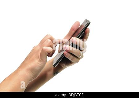 Woman hand using smartphone over white background Stock Photo