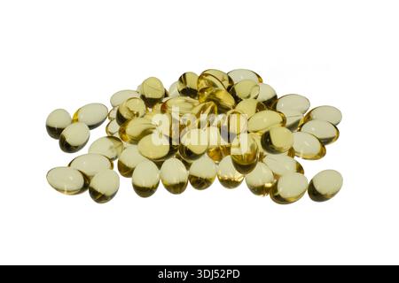 Gold gel cap vitamins isolated on white background Stock Photo