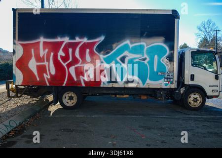 A warehouse truck with graffiti on it in Vancouver, BC. Stock Photo