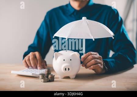 bank piggy money protect financial insurance concept risk umbrella collage finance featuring man holding white umbrella over piggy bank near calculato Stock Photo