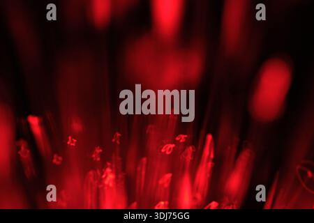 Abstract red optical fiber, concept of data and energy transmission Stock Photo