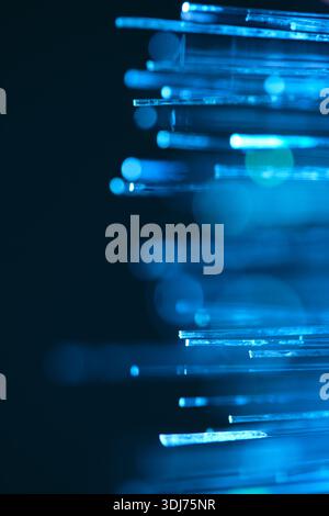 Blue optical fibers close up abstract background. Shallow depth field Stock Photo