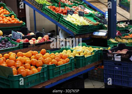Fresh fruits displayed at a market stall for sale at the Central Market Hall in Budapest, Hungary Stock Photo