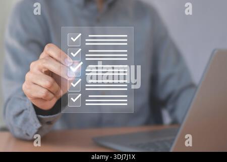 Concepts related to business and technology efficiency digital document checklists on-screen and document validation management. Stock Photo