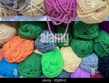Where Color Waits Patiently: Wool Shelves in Madrid (Madrid, Spain: January 5th, 2026) Stock Photo