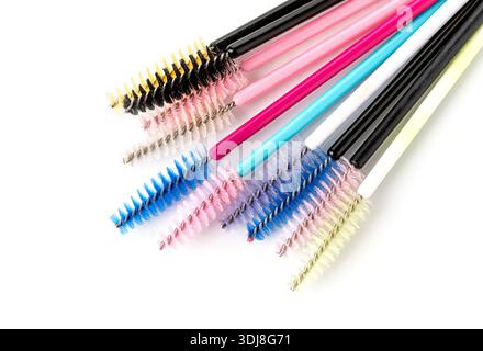Group of vibrant disposable mascara applicators on a white background Stock Photo
