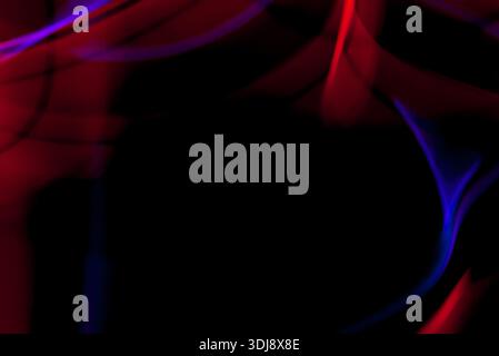 Subtle dark energy light lines forming mysterious abstract motion on black background. Stock Photo