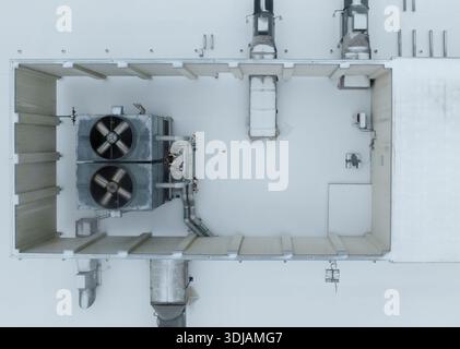 Snowy HVAC units on buildings in North Carolina Stock Photo