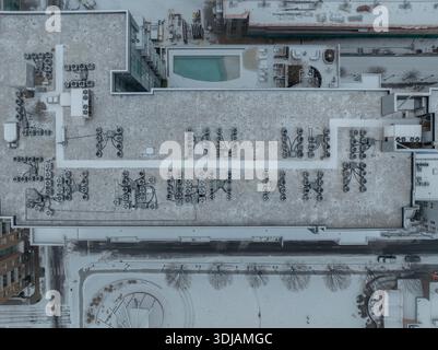 Snowy HVAC units on buildings in North Carolina Stock Photo