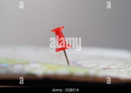 Pin marks location on a map in a simple setting Stock Photo