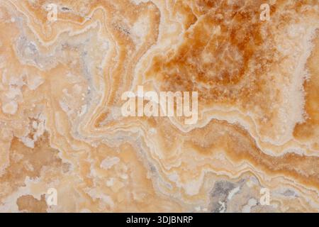 Onyx Miele background, natural texture in warm tone for interior work. Stock Photo