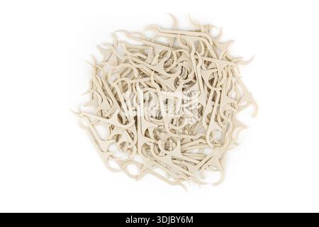 Eco friendly corn starch dental toothpick with dental floss on white background. Stock Photo
