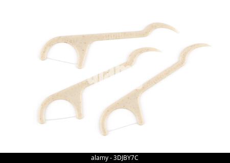 Eco friendly corn starch dental toothpick with dental floss on white background. Stock Photo