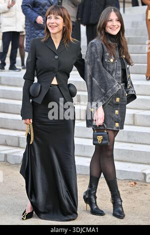 sophie-marceau-juliette-lemley-arriving-at-the-schiaparelli-show