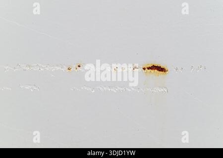 White-painted metal with rust Stock Photo