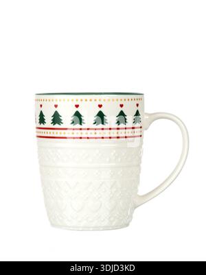 Ceramic Christmas mug with embossed patterns and a festive border of green trees and red hearts. Isolated on a white  Stock Photo
