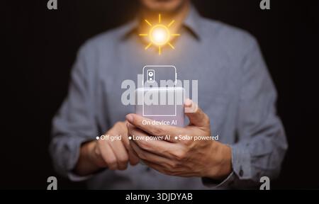 Solar powered AI concept in mobile technology. On device artificial intelligence running on low power and off grid using clean renewable energy from t Stock Photo