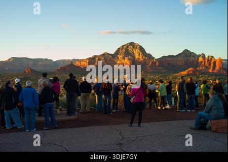 A crowd of sight seer's await sunset at the Airport look out in Sedona Arizona Stock Photo