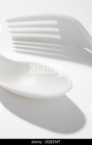 WA31003-00.....WASHINGTON - Polypropylene spoon and fork on white. Stock Photo