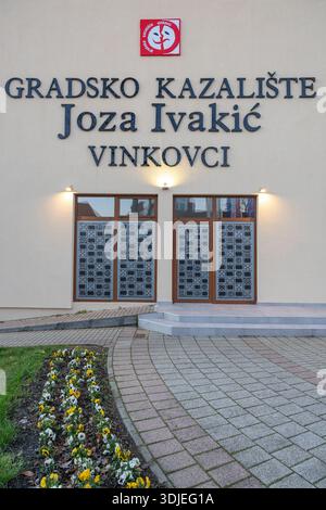 VINKOVCI, CROATIA, 12.27.2025:Exterior view of City Theater Joza Ivakić in Vinkovci, Croatia. A grand sign, double doors with decorative panels, surro Stock Photo