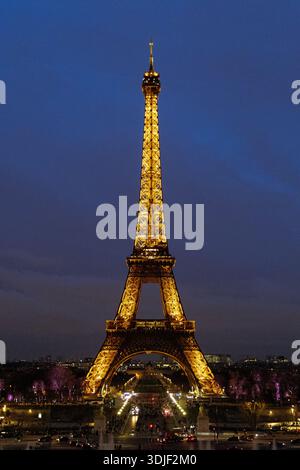 Eiffel tower illuminated at night, Paris, France Stock Photo