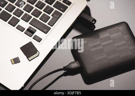 Multiple storage devices, pendrive, memory cards. Storage media concept Stock Photo