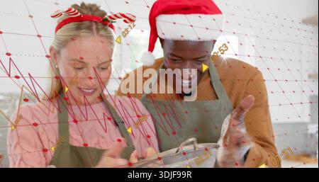 Mixing couple in aprons stirring at kitchen counter with bowl, floured hands and red data overlay Stock Photo