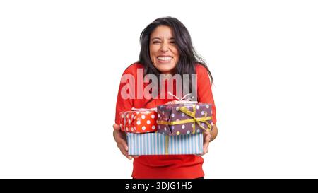Happy woman holding stack of birthday gifts Stock Photo