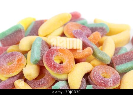 assorted jelly candies floating on white background. Stock Photo