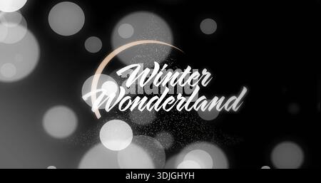 Displaying stylized Winter Wonderland text centered on dark banner showing beige arc bokeh sparkles Stock Photo