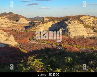 Rugged Cliffs and Autumn Colors in Jiangfu Mountain Stock Photo