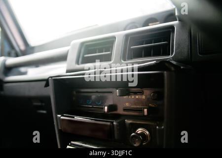 close up of air ventilation and AC control panel on dashboard old car Stock Photo