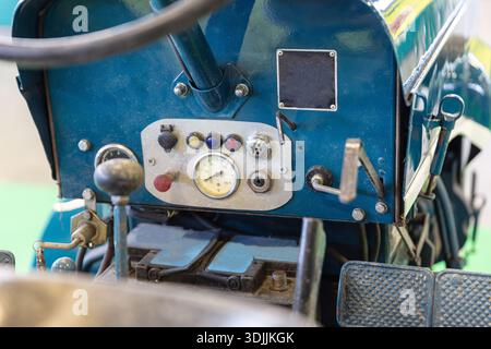 BERLIN, GERMANY, January 16th 2026: Photo of Close up of a vintage tractor dashboard with gauges and controls at an agriculture trade fair in Berlin G Stock Photo