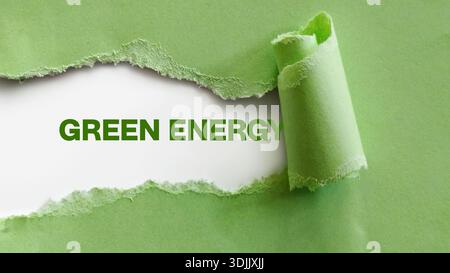 Green Paper Torn to Reveal Bold Green Energy Message on White Background Stock Photo
