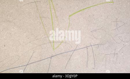 Kids Table Surface with Pencil and Colored Doodles Showing Creative Play and Learning Stock Photo