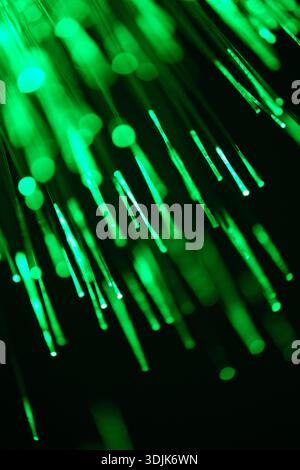 Fiber optical network cable close up. Macro shot of fiber optic light strands Stock Photo