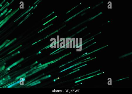 Abstract background macro close up of fiber optic light strands in green Stock Photo