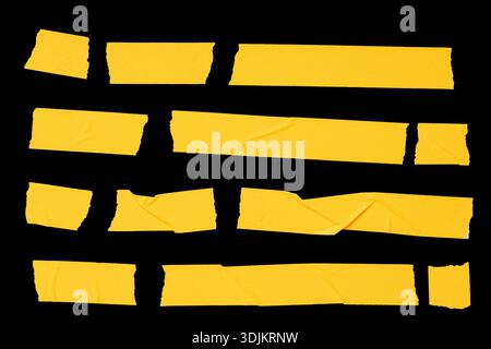 Set of Orange Masking Tape Strips isolated on black background. Template mock up Stock Photo