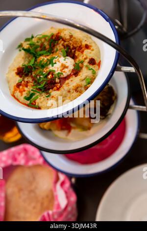 Different types of meze dishes served on table Stock Photo