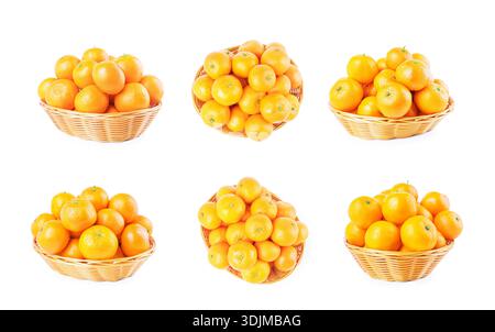 Set of fresh ripe tangerines in wicker baskets isolated on white background. Collage of citrus fruits shown from different angles for healthy diet con Stock Photo