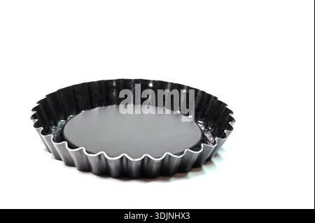 Baking tins against a white background Stock Photo
