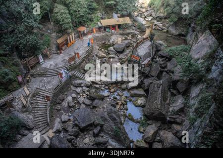 A deep ravine in Jindao Canyon scenic area in Beibei district, Chongqing, China. The rugged karst landscape is extremely beautiful and dramatic. Stock Photo