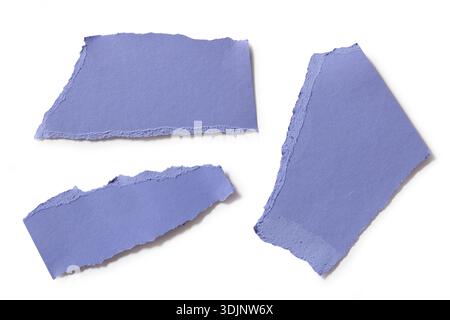 blue color torn paper pieces isolated on white background, top view Stock Photo