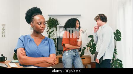 Office Workplace Bullying, Toxic Office Environment with Gossip between Coworkers Stock Photo