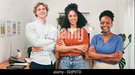 Three Confident Colleagues Standing Together in a Modern Office for Teamwork and Collaboration Stock Photo