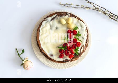 Homemade easter cake with raspberry on a white background. High quality photo Stock Photo