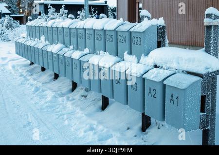 Group of mailboxes in winter snow Stock Photo