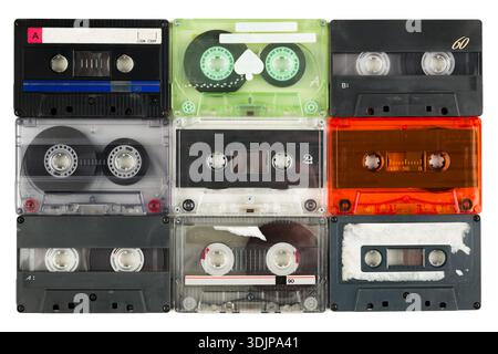 Set of retro cassette tapes variety, isolated on white background. Top view. Stock Photo
