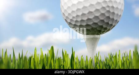 Close up of golf ball on tee with green grass Stock Photo