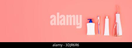 Flat lay composition with manual toothbrush, irrigatoro, toothpaste and oral hygiene products on colored background. Flat lay concept. oral care conce Stock Photo